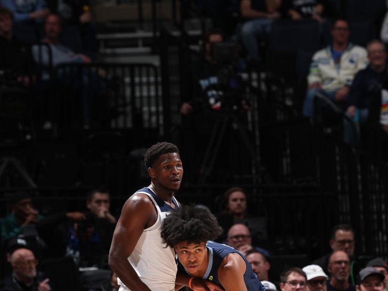 MINNEAPOLIS, MN -  JANUARY 11: Anthony Edwards #5 of the Minnesota Timberwolves plays defense during the game against Jaylen Wells #0 of the Memphis Grizzlies on January 11, 2025 at Target Center in Minneapolis, Minnesota. NOTE TO USER: User expressly acknowledges and agrees that, by downloading and or using this Photograph, user is consenting to the terms and conditions of the Getty Images License Agreement. Mandatory Copyright Notice: Copyright 2025 NBAE (Photo by David Sherman/NBAE via Getty Images)