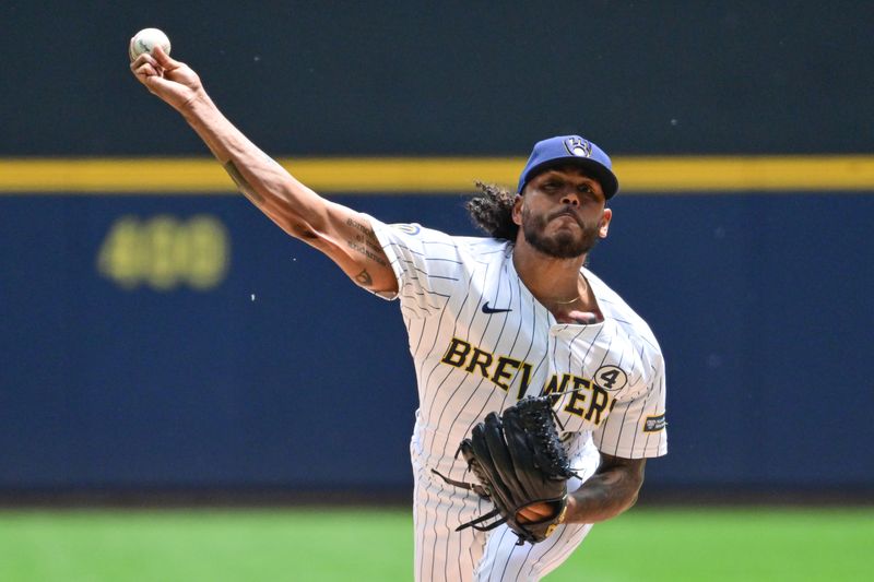 Jun 2, 2024; Milwaukee, Wisconsin, USA; Milwaukee Brewers starting pitcher Freddy Peralta (51) pitches against the Chicago White Sox in the first inning at American Family Field. Mandatory Credit: Benny Sieu-USA TODAY Sports