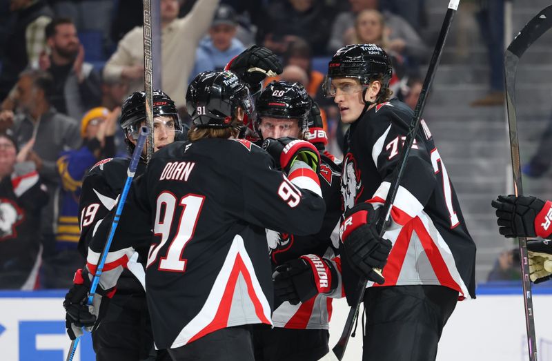 Dec 18, 2025; Buffalo, New York, USA;  Buffalo Sabres center Tage Thompson (72) celebrates his goal with teammates during the second period against the Philadelphia Flyers at KeyBank Center. Mandatory Credit: Timothy T. Ludwig-Imagn Images