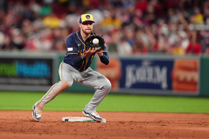 May 24, 2024; Boston, Massachusetts, USA; Milwaukee Brewers second baseman Brice Turang (2) catches a throw to start a double play against the Boston Red Sox during the ninth inning at Fenway Park. Mandatory Credit: Gregory Fisher-USA TODAY Sports