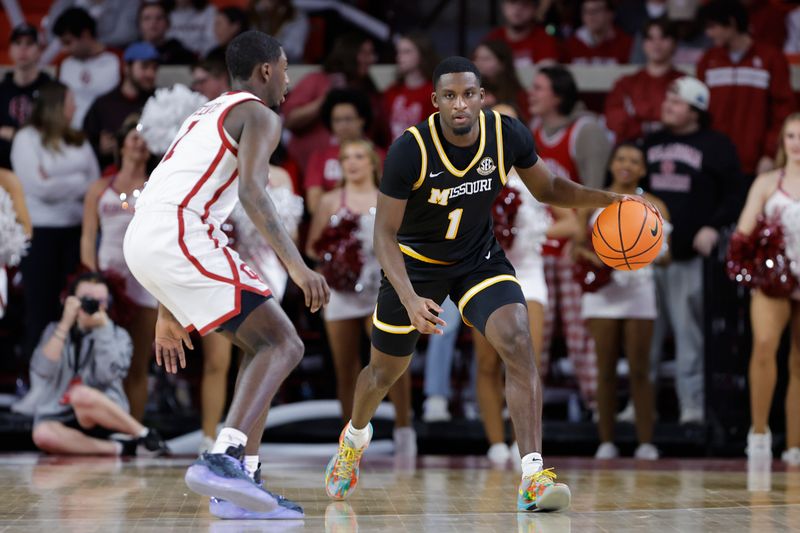 Mar 5, 2025; Norman, Oklahoma, USA; Missouri Tigers guard Marques Warrick (1) dribbles the ball down the court against the Oklahoma Soooners during the first half at Lloyd Noble Center. Mandatory Credit: Alonzo Adams-Imagn Images