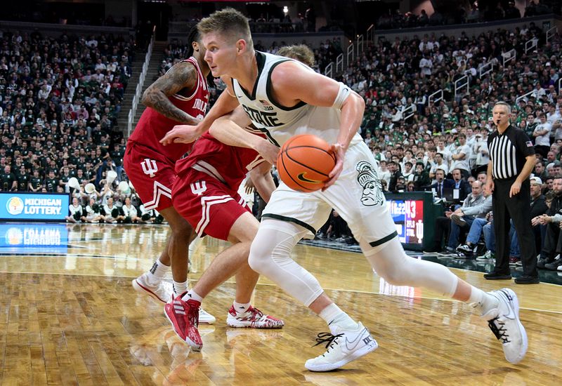 Jan 13, 2026; East Lansing, Michigan, USA;  Michigan State Spartans forward Jaxon Kohler (0) drives the baseline during the second half against the Indiana Hoosiers at Jack Breslin Student Events Center. Mandatory Credit: Dale Young-Imagn Images