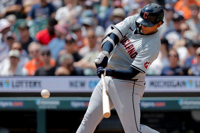 Jul 11, 2024; Detroit, Michigan, USA;  Cleveland Guardians catcher Bo Naylor (23) hits a home run in the third inning against the Detroit Tigers at Comerica Park. Mandatory Credit: Rick Osentoski-USA TODAY Sports