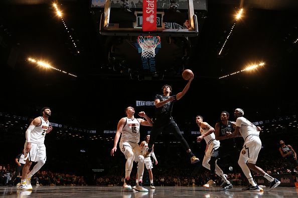 BROOKLYN, NY - DECEMBER 22: Cameron Johnson #2 of the Brooklyn Nets goes to the basket during the game on December 22, 2023 at Barclays Center in Brooklyn, New York. NOTE TO USER: User expressly acknowledges and agrees that, by downloading and or using this Photograph, user is consenting to the terms and conditions of the Getty Images License Agreement. Mandatory Copyright Notice: Copyright 2023 NBAE (Photo by Nathaniel S. Butler/NBAE via Getty Images)