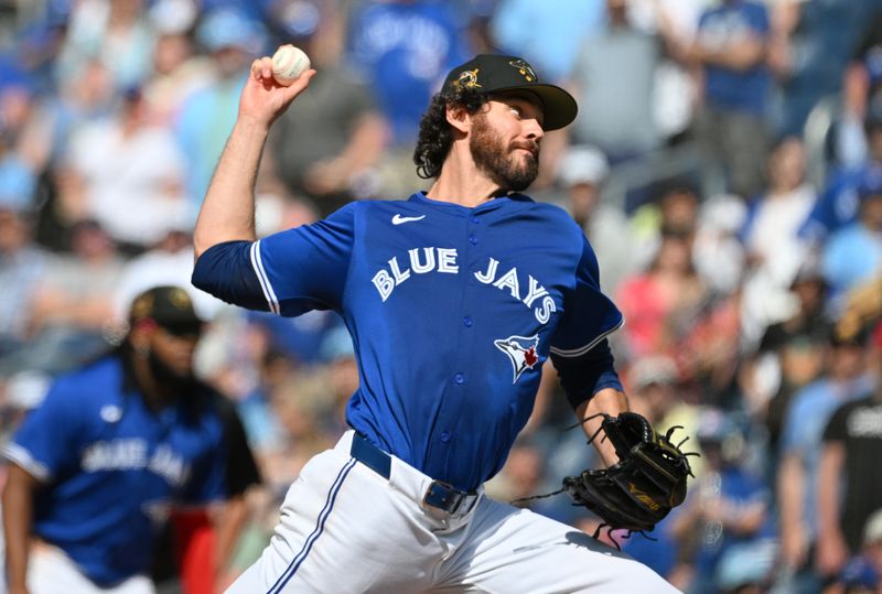 May 19, 2024; Toronto, Ontario, CAN;  Toronto Blue Jays relief pitcher Jordan Romano (68) delivers a pitch against the Tampa Bay Rays in the ninth inning at Rogers Centre. Mandatory Credit: Dan Hamilton-USA TODAY Sports