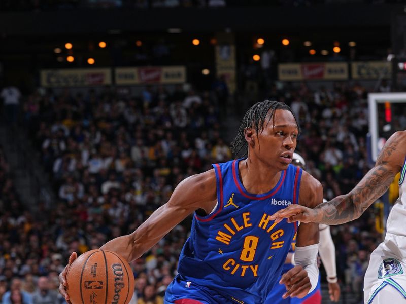 DENVER, CO - MARCH 29: Peyton Watson #8 of the Denver Nuggets dribbles the ball during the game against the Minnesota Timberwolves on March 29, 2024 at the Ball Arena in Denver, Colorado. NOTE TO USER: User expressly acknowledges and agrees that, by downloading and/or using this Photograph, user is consenting to the terms and conditions of the Getty Images License Agreement. Mandatory Copyright Notice: Copyright 2024 NBAE (Photo by Bart Young/NBAE via Getty Images)