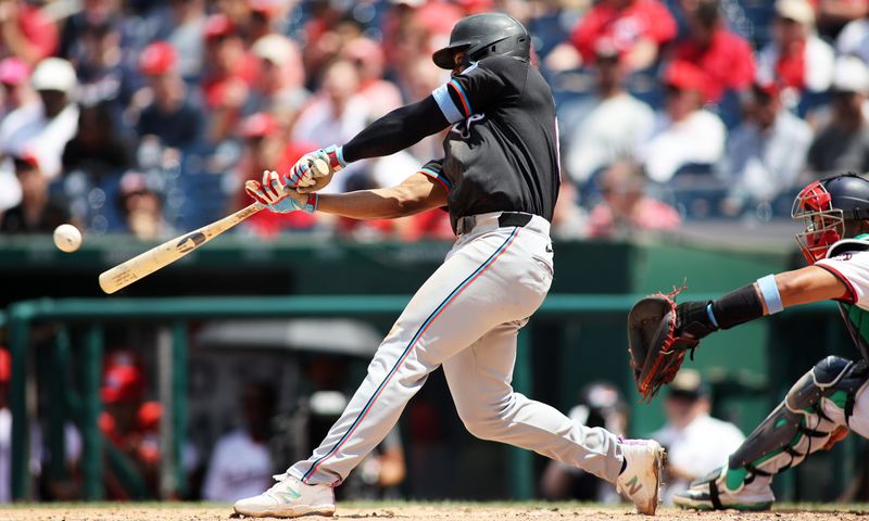 Jun 16, 2024; Washington, District of Columbia, USA; Miami Marlins second base Otto Lopez (61) flies out during the fifth inning in a game against the Washington Nationals at Nationals Park. Mandatory Credit: Daniel Kucin Jr.-USA TODAY Sports