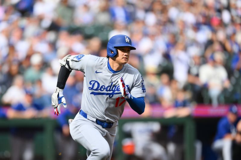Sep 28, 2025; Seattle, Washington, USA; Los Angeles Dodgers designated hitter Shohei Ohtani (17) runs towards first base after hitting a double against the Seattle Mariners during the first inning at T-Mobile Park. Mandatory Credit: Steven Bisig-Imagn Images
