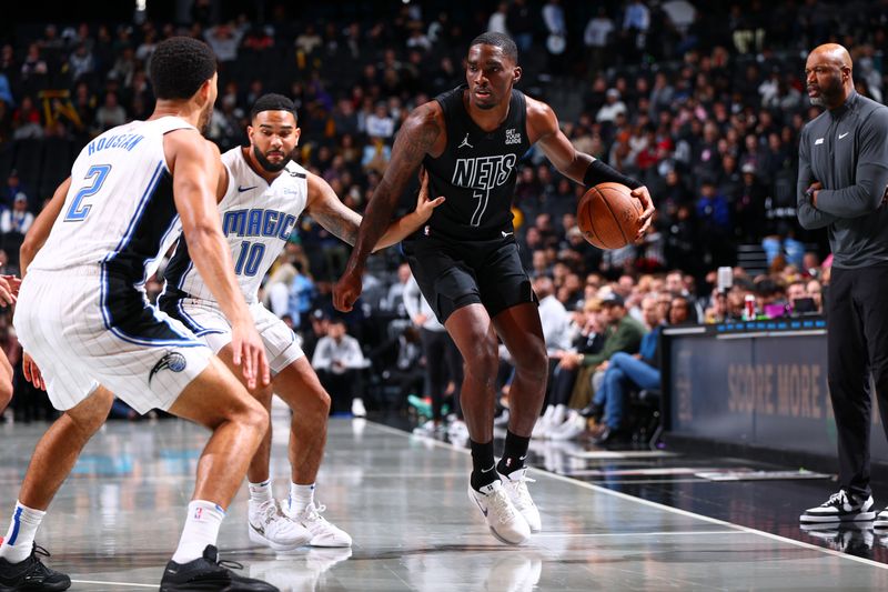 BROOKLYN, NY - NOVEMBER 29: Shake Milton #7 of the Brooklyn Nets dribbles the ball during the game against the Orlando Magic during a Emirates NBA Cup game on October 22, 2024 at Barclays Center in Brooklyn, New York. NOTE TO USER: User expressly acknowledges and agrees that, by downloading and or using this Photograph, user is consenting to the terms and conditions of the Getty Images License Agreement. Mandatory Copyright Notice: Copyright 2024 NBAE (Photo by David L. Nemec/NBAE via Getty Images)