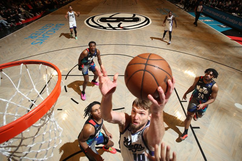 BROOKLYN, NY - APRIL 7: Domantas Sabonis #10 of the Sacramento Kings drives to the basket during the game against the Brooklyn Nets on April 7, 2024 at Barclays Center in Brooklyn, New York. NOTE TO USER: User expressly acknowledges and agrees that, by downloading and or using this Photograph, user is consenting to the terms and conditions of the Getty Images License Agreement. Mandatory Copyright Notice: Copyright 2024 NBAE (Photo by Nathaniel S. Butler/NBAE via Getty Images)