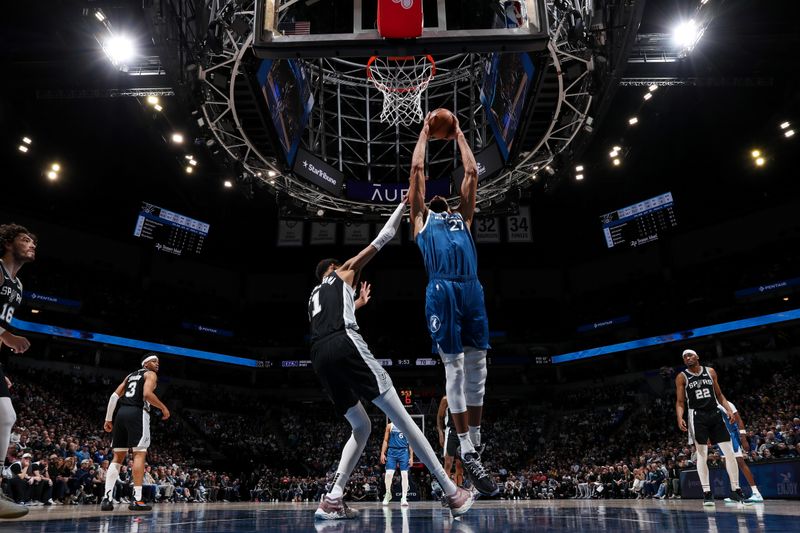 MINNEAPOLIS, MN -  FEBRUARY 27: Rudy Gobert #27 of the Minnesota Timberwolves drives to the basket during the game against the San Antonio Spurs on February 27, 2024 at Target Center in Minneapolis, Minnesota. NOTE TO USER: User expressly acknowledges and agrees that, by downloading and or using this Photograph, user is consenting to the terms and conditions of the Getty Images License Agreement. Mandatory Copyright Notice: Copyright 2024 NBAE (Photo by Jordan Johnson/NBAE via Getty Images)
