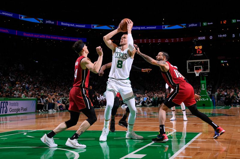 BOSTON, MA - APRIL 21: Kristaps Porzingis #8 of the Boston Celtics shoots the ball during the game against the Miami Heat during Round 1 Game 1 of the 2024 NBA Playoffs on April 21, 2024 at the TD Garden in Boston, Massachusetts. NOTE TO USER: User expressly acknowledges and agrees that, by downloading and or using this photograph, User is consenting to the terms and conditions of the Getty Images License Agreement. Mandatory Copyright Notice: Copyright 2024 NBAE  (Photo by Brian Babineau/NBAE via Getty Images)