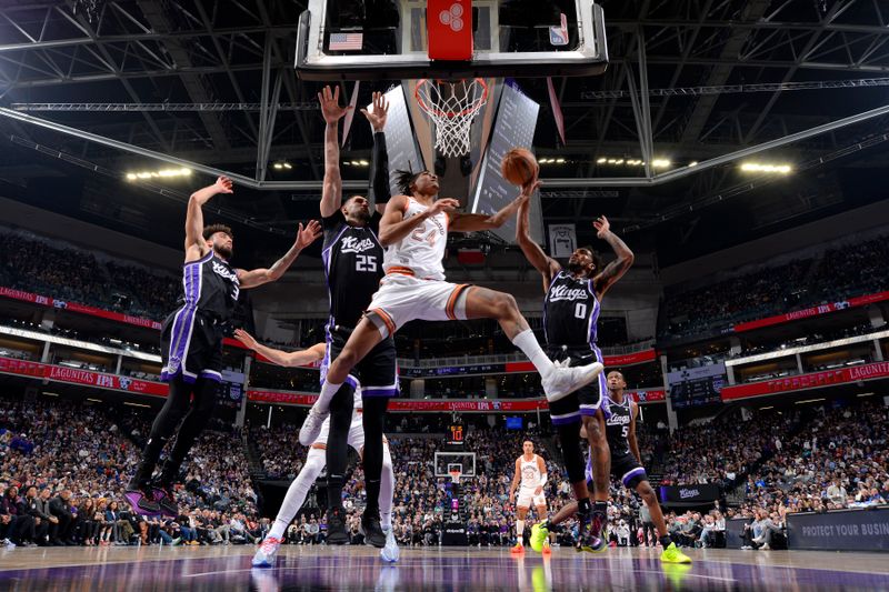 SACRAMENTO, CA - FEBRUARY 22: Devin Vassell #24 of the San Antonio Spurs drives to the basket during the game against the Sacramento Kings on February 22, 2024 at Golden 1 Center in Sacramento, California. NOTE TO USER: User expressly acknowledges and agrees that, by downloading and or using this Photograph, user is consenting to the terms and conditions of the Getty Images License Agreement. Mandatory Copyright Notice: Copyright 2023 NBAE (Photo by Rocky Widner/NBAE via Getty Images)