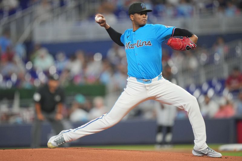 Jul 7, 2024; Miami, Florida, USA;  Miami Marlins starting pitcher Edward Cabrera (27) pitches against the Chicago White Sox at loanDepot Park. Mandatory Credit: Jim Rassol-USA TODAY Sports