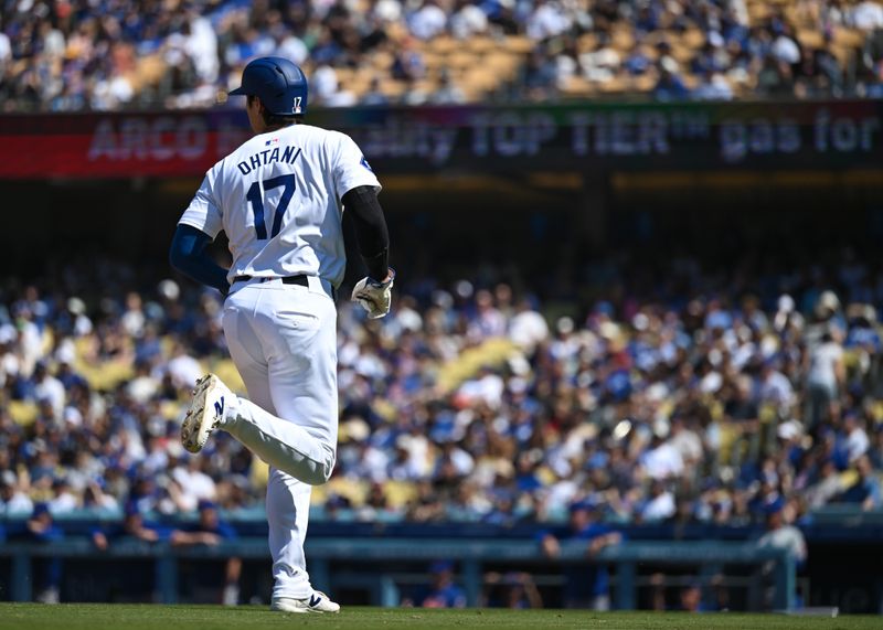 Apr 21, 2024; Los Angeles, California, USA; Los Angeles Dodgers designated hitter Shohei Ohtani (17) runs the bases against the New York Mets during the sixth inning at Dodger Stadium. Mandatory Credit: Jonathan Hui-USA TODAY Sports