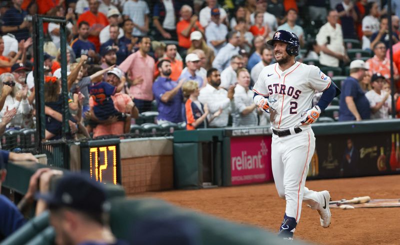 Jul 9, 2024; Houston, Texas, USA;  Houston Astros third baseman Alex Bregman (2) reacts after he hit a two run home run against the Miami Marlins in the seventh inning at Minute Maid Park. Mandatory Credit: Thomas Shea-USA TODAY Sports