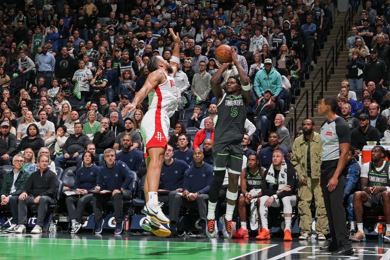 MINNEAPOLIS, MN -  NOVEMBER 26: Anthony Edwards #5 of the Minnesota Timberwolves shoots a three point basket during the game against the Houston Rockets during the Emirates NBA Cup game on November 26, 2024 at Target Center in Minneapolis, Minnesota. NOTE TO USER: User expressly acknowledges and agrees that, by downloading and or using this Photograph, user is consenting to the terms and conditions of the Getty Images License Agreement. Mandatory Copyright Notice: Copyright 2024 NBAE (Photo by David Sherman/NBAE via Getty Images)