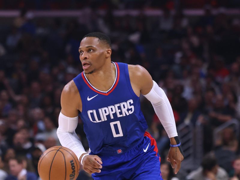 LOS ANGELES, CALIFORNIA - DECEMBER 12: Russell Westbrook #0 of the LA Clippers brings up the ball during a 119-99 Clippers win over the Sacramento Kings at Crypto.com Arena on December 12, 2023 in Los Angeles, California.  NOTE TO USER: User expressly acknowledges and agrees that, by downloading and or using this photograph, User is consenting to the terms and conditions of the Getty Images License Agreement. (Photo by Harry How/Getty Images)