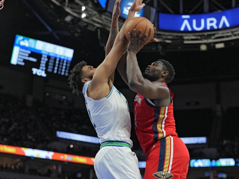 MINNEAPOLIS, MN -  JANUARY 3:  Zion Williamson #1 of the New Orleans Pelicans drives to the basket during the game as Karl-Anthony Towns #32 of the Minnesota Timberwolves plays defense on January 3, 2024 at Target Center in Minneapolis, Minnesota. NOTE TO USER: User expressly acknowledges and agrees that, by downloading and or using this Photograph, user is consenting to the terms and conditions of the Getty Images License Agreement. Mandatory Copyright Notice: Copyright 2024 NBAE (Photo by Jordan Johnson/NBAE via Getty Images)