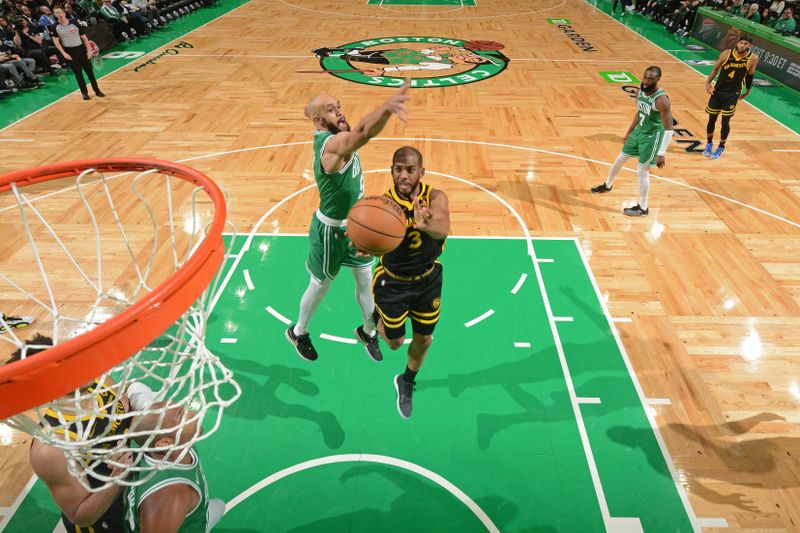 BOSTON, MA - MARCH 3: Chris Paul #3 of the Golden State Warriors drives to the basket during the game against the Boston Celtics on March 3, 2024 at the TD Garden in Boston, Massachusetts. NOTE TO USER: User expressly acknowledges and agrees that, by downloading and or using this photograph, User is consenting to the terms and conditions of the Getty Images License Agreement. Mandatory Copyright Notice: Copyright 2024 NBAE  (Photo by Brian Babineau/NBAE via Getty Images)