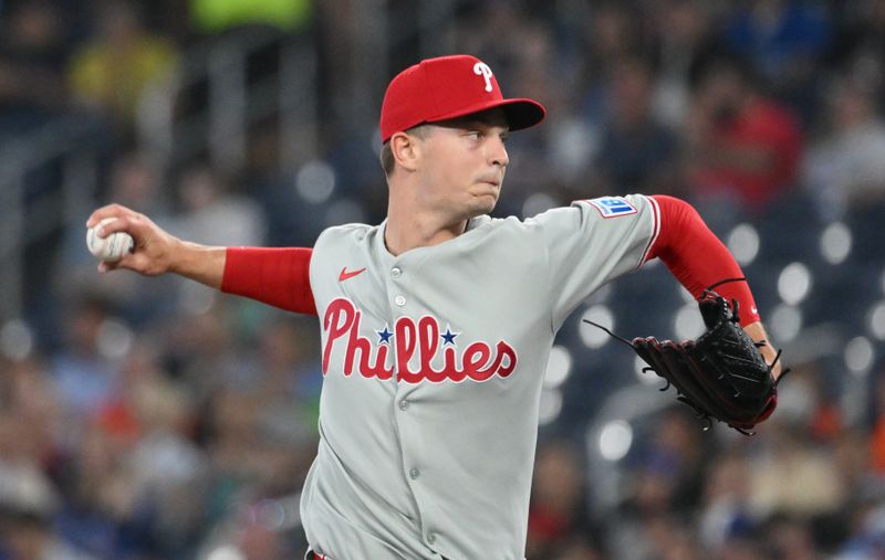 Jun 4, 2025; Toronto, Ontario, CAN;  Philadelphia Phillies starting pitcher Mick Abel (40) delivers a pitch against the Toronto Blue Jays in the first inning at Rogers Centre. Mandatory Credit: Dan Hamilton-Imagn Images