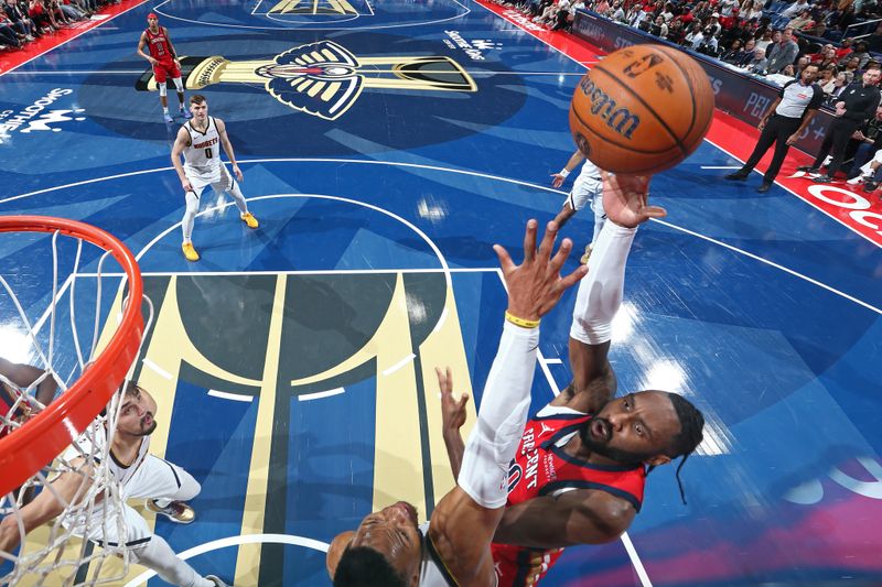 NEW ORLEANS, LA - NOVEMBER 15: Jaylen Nowell #20 of the New Orleans Pelicans shoots the ball during the game against the Denver Nuggets during the Emirates NBA Cup game on November 15, 2024 at the Smoothie King Center in New Orleans, Louisiana. NOTE TO USER: User expressly acknowledges and agrees that, by downloading and or using this Photograph, user is consenting to the terms and conditions of the Getty Images License Agreement. Mandatory Copyright Notice: Copyright 2024 NBAE (Photo by Layne Murdoch Jr./NBAE via Getty Images)