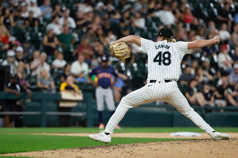 Jun 18, 2024; Chicago, Illinois, USA; Chicago White Sox starting pitcher Jonathan Cannon (48) delivers a pitch agains the Houston Astros during the eight inning at Guaranteed Rate Field. Mandatory Credit: Kamil Krzaczynski-USA TODAY Sports