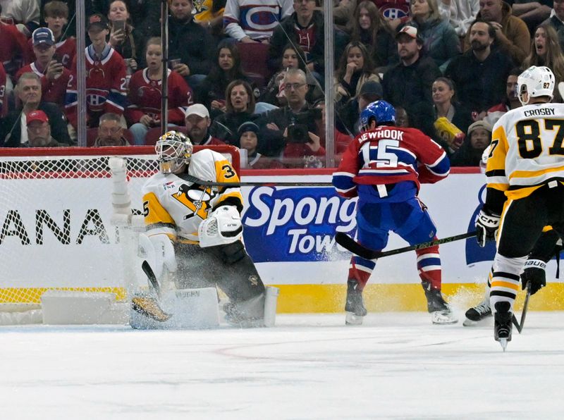 Oct 14, 2024; Montreal, Quebec, CAN; The stick of Montreal Canadiens forward Alex Newhook (15) hits Pittsburgh Penguins goalie Tristan Jarry (35) in the throat during the third period at the Bell Centre. Mandatory Credit: Eric Bolte-Imagn Images