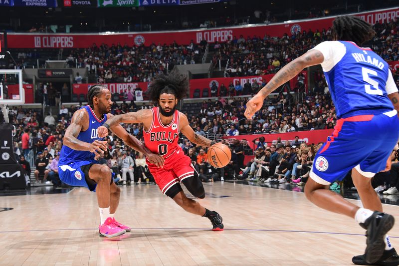 LOS ANGELES, CA - MARCH 9: Coby White #0 of the Chicago Bulls drives to the basket during the game against the LA Clippers  on March 9, 2024 at Crypto.Com Arena in Los Angeles, California. NOTE TO USER: User expressly acknowledges and agrees that, by downloading and/or using this Photograph, user is consenting to the terms and conditions of the Getty Images License Agreement. Mandatory Copyright Notice: Copyright 2024 NBAE (Photo by Adam Pantozzi/NBAE via Getty Images)