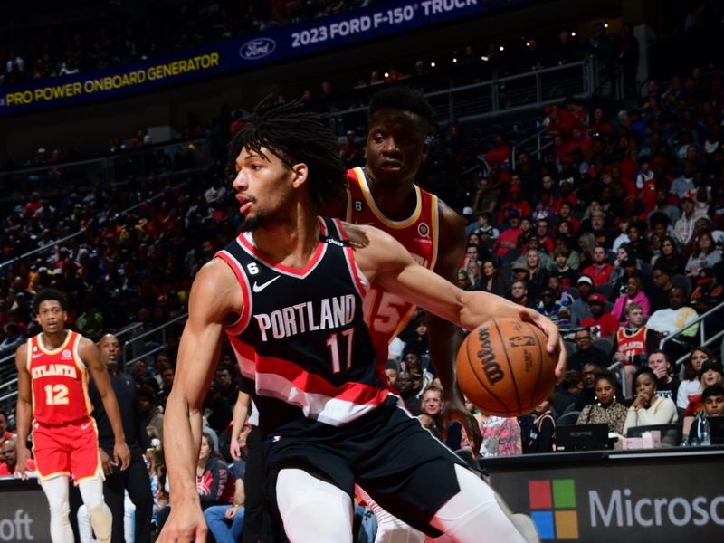 ATLANTA, GA - MARCH 3: Shaedon Sharpe #17 of the Portland Trail Blazers dribbles the ball during the game against the Atlanta Hawks on March 3, 2023 at State Farm Arena in Atlanta, Georgia.  NOTE TO USER: User expressly acknowledges and agrees that, by downloading and/or using this Photograph, user is consenting to the terms and conditions of the Getty Images License Agreement. Mandatory Copyright Notice: Copyright 2023 NBAE (Photo by Scott Cunningham/NBAE via Getty Images)