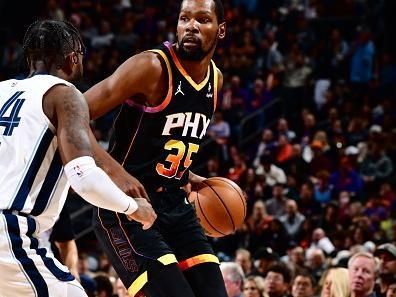 PHOENIX, AZ - DECEMBER 2: Kevin Durant #35 of the Phoenix Suns handles the ball during the game against the Memphis Grizzlies on December 2, 2023 at Footprint Center in Phoenix, Arizona. NOTE TO USER: User expressly acknowledges and agrees that, by downloading and or using this photograph, user is consenting to the terms and conditions of the Getty Images License Agreement. Mandatory Copyright Notice: Copyright 2023 NBAE (Photo by Barry Gossage/NBAE via Getty Images)