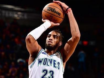 PHOENIX, AZ - NOVEMBER 15: Troy Brown Jr. #23 of the Minnesota Timberwolves prepares to shoot a free throw during the game against the Phoenix Suns on November 15, 2023 at Footprint Center in Phoenix, Arizona. NOTE TO USER: User expressly acknowledges and agrees that, by downloading and or using this photograph, user is consenting to the terms and conditions of the Getty Images License Agreement. Mandatory Copyright Notice: Copyright 2023 NBAE (Photo by Barry Gossage/NBAE via Getty Images)