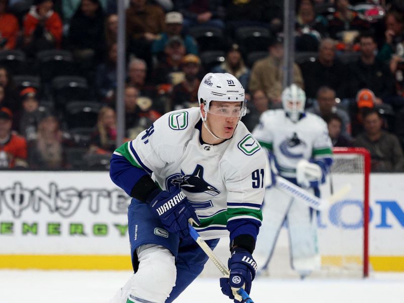 Mar 3, 2024; Anaheim, California, USA; Vancouver Canucks defenseman Nikita Zadorov (91) during the first period against the Anaheim Ducks at Honda Center. Mandatory Credit: Jason Parkhurst-USA TODAY Sports