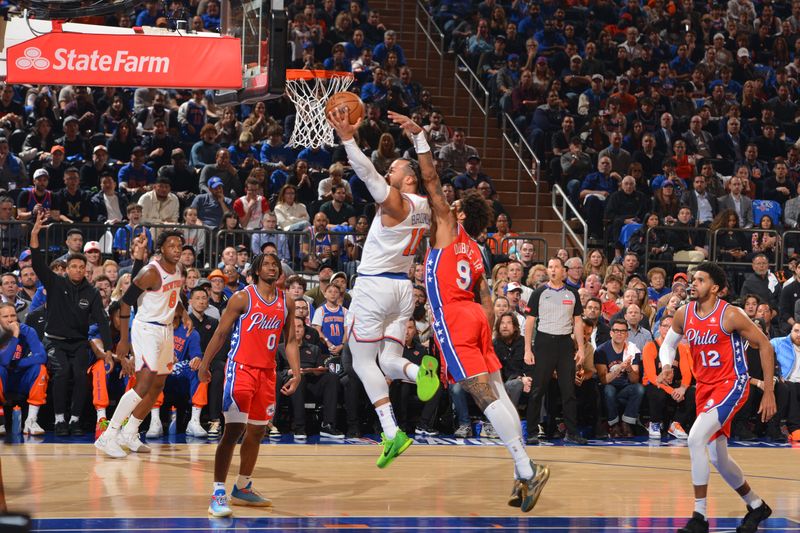 NEW YORK, NY - APRIL 20: Jalen Brunson #11 of the New York Knicks drives to the basket during the game against the Philadelphia 76ers during Round 1 Game 1 of the 2024 NBA Playoffs on April 20, 2024 at Madison Square Garden in New York City, New York.  NOTE TO USER: User expressly acknowledges and agrees that, by downloading and or using this photograph, User is consenting to the terms and conditions of the Getty Images License Agreement. Mandatory Copyright Notice: Copyright 2024 NBAE  (Photo Jesse D. Garrabrant/NBAE via Getty Images)