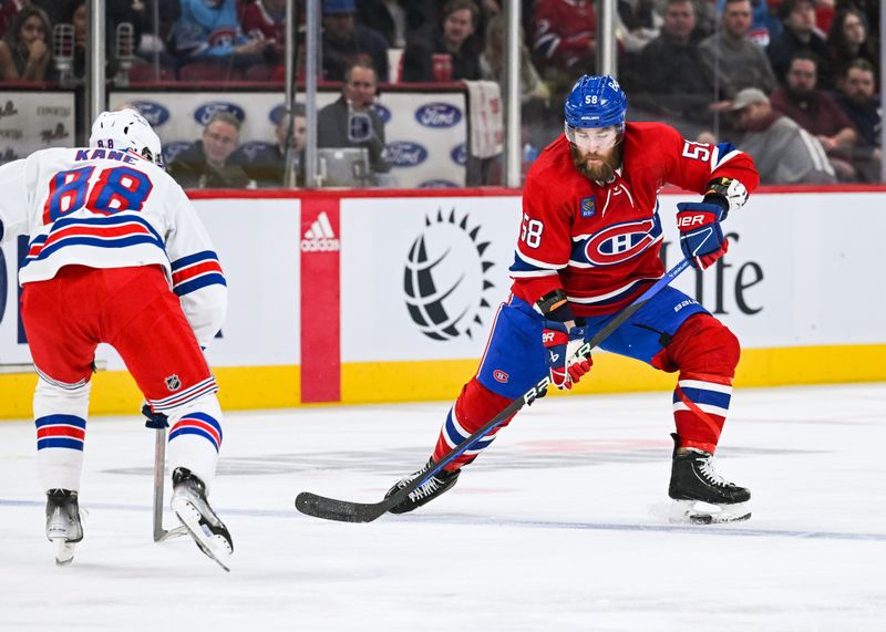 Mar 9, 2023; Montreal, Quebec, CAN; Montreal Canadiens defenseman David Savard (58) intercepts the puck with his skate at the blue line against the New York Rangers during the second period at Bell Centre. Mandatory Credit: David Kirouac-USA TODAY Sports