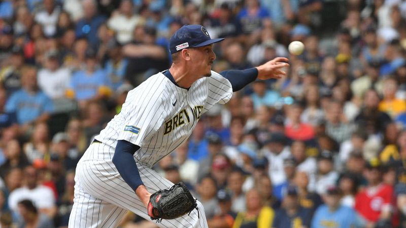 Jun 15, 2024; Milwaukee, Wisconsin, USA; jMilwaukee Brewers pitcher Bryan Hudson (52) delivers a pitch against the Cincinnati Reds in the seventh inning at American Family Field. Mandatory Credit: Michael McLoone-USA TODAY Sports