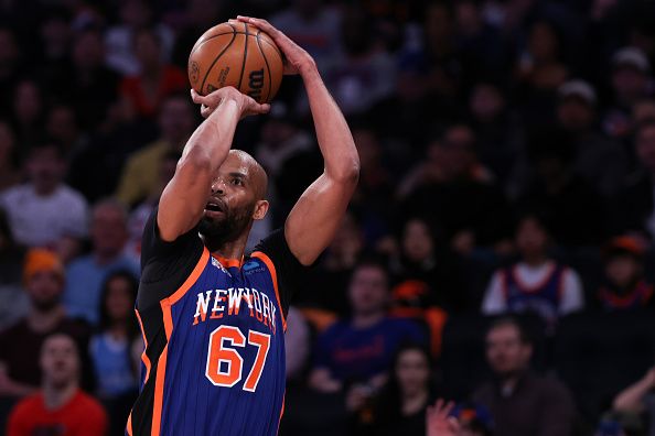 NEW YORK, NEW YORK - DECEMBER 23: Taj Gibson #67 of the New York Knicks shoots the ball during the first quarter of the game against the Milwaukee Bucks at Madison Square Garden on December 23, 2023 in New York City. NOTE TO USER: User expressly acknowledges and agrees that, by downloading and or using this photograph, User is consenting to the terms and conditions of the Getty Images License Agreement. (Photo by Dustin Satloff/Getty Images)