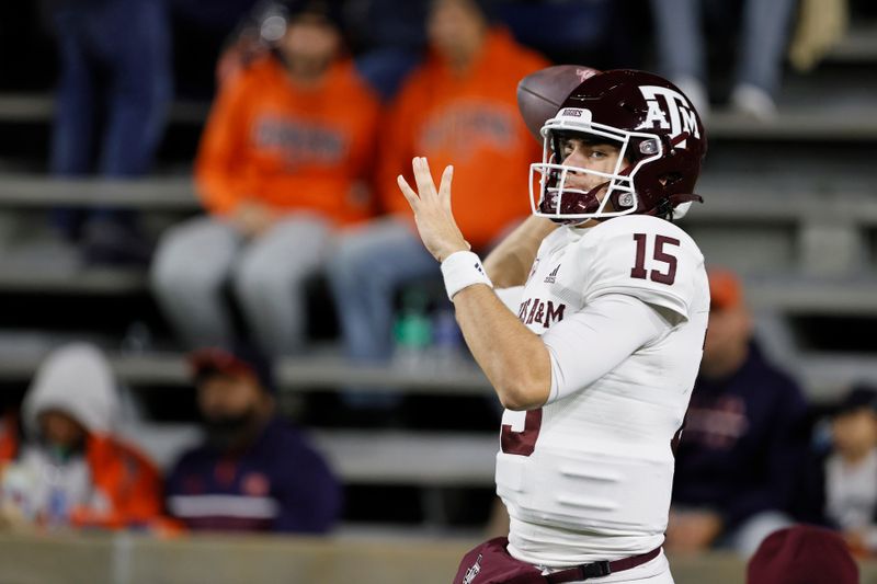 Nov 12, 2022; Auburn, Alabama, USA;  Texas A&M Aggies quarterback Conner Weigman (15) warms up before the game against the Auburn Tigers at Jordan-Hare stadium. Mandatory Credit: John Reed-USA TODAY Sports