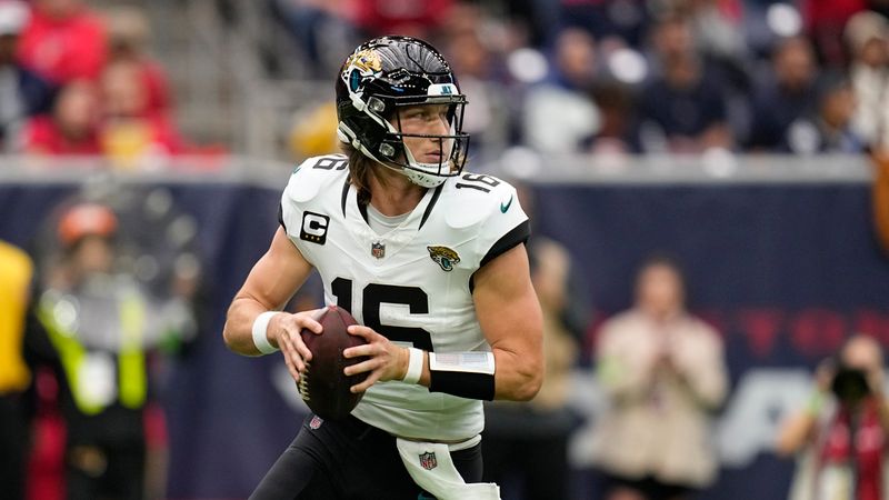 Jacksonville Jaguars quarterback Trevor Lawrence (16) looks to pass against the Houston Texans during the first half of an NFL football game Sunday, Nov. 26, 2023, in Houston. (AP Photo/Eric Gay)