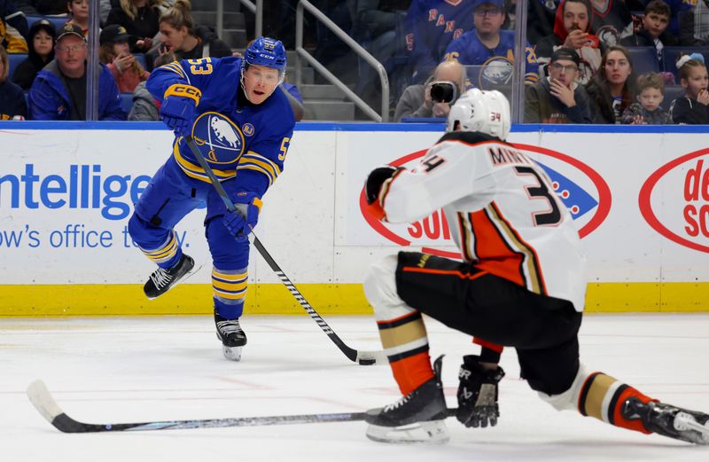 Feb 19, 2024; Buffalo, New York, USA;  Anaheim Ducks defenseman Pavel Mintyukov (34) looks to block a shot by Buffalo Sabres left wing Jeff Skinner (53) during the second period at KeyBank Center. Mandatory Credit: Timothy T. Ludwig-USA TODAY Sports