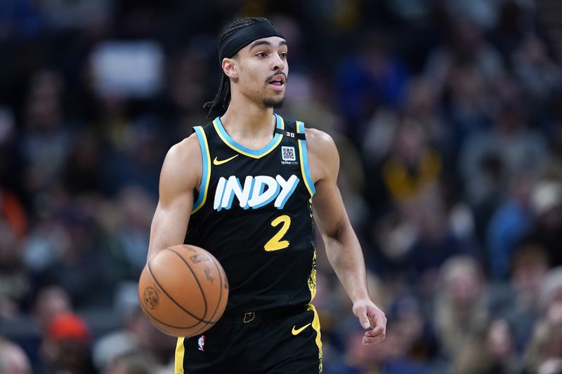 INDIANAPOLIS, INDIANA - JANUARY 28: Andrew Nembhard #2 of the Indiana Pacers dribbles the ball in the second quarter against the Memphis Grizzlies at Gainbridge Fieldhouse on January 28, 2024 in Indianapolis, Indiana. NOTE TO USER: User expressly acknowledges and agrees that, by downloading and or using this photograph, User is consenting to the terms and conditions of the Getty Images License Agreement. (Photo by Dylan Buell/Getty Images)