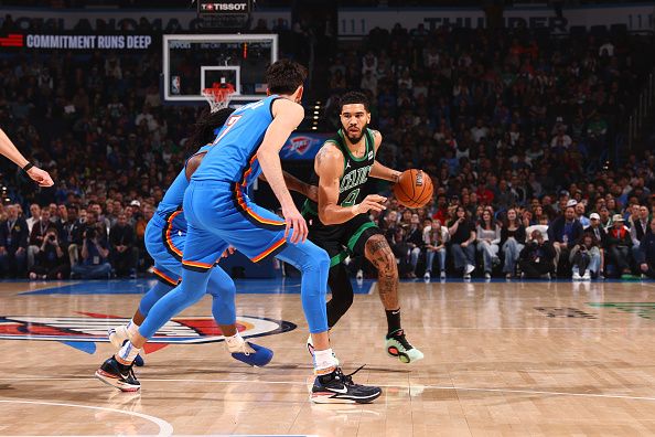 OKLAHOMA CITY, OK - JANUARY 2: Jayson Tatum #0 of the Boston Celtics dribbles the ball during the game against the Oklahoma City Thunder on January 2, 2024 at Paycom Arena in Oklahoma City, Oklahoma. NOTE TO USER: User expressly acknowledges and agrees that, by downloading and or using this photograph, User is consenting to the terms and conditions of the Getty Images License Agreement. Mandatory Copyright Notice: Copyright 2024 NBAE (Photo by Zach Beeker/NBAE via Getty Images)