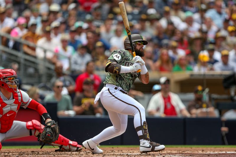 May 21, 2023; San Diego, California, USA;   San Diego Padres second baseman Rougned Odor (24) hits a three RBI double in the first inning against the Boston Red Soxat Petco Park. Mandatory Credit: David Frerker-USA TODAY Sports
