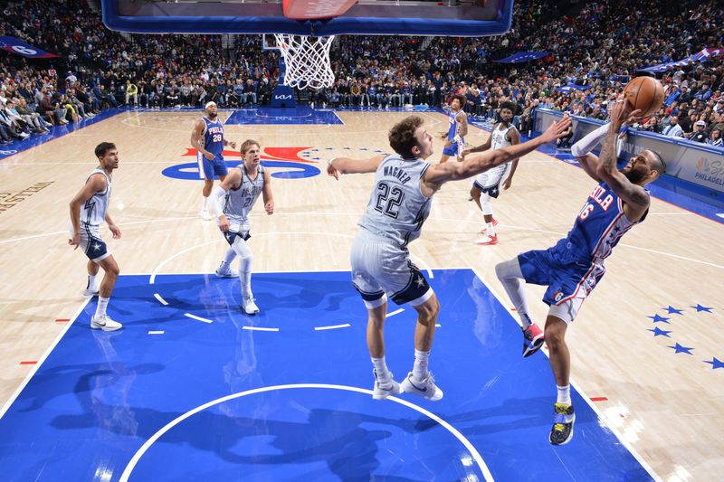 PHILADELPHIA, PA - DECEMBER 4: Caleb Martin #16 of the Philadelphia 76ers shoots the ball during the game against the Orlando Magic on December 4, 2024 at the Wells Fargo Center in Philadelphia, Pennsylvania NOTE TO USER: User expressly acknowledges and agrees that, by downloading and/or using this Photograph, user is consenting to the terms and conditions of the Getty Images License Agreement. Mandatory Copyright Notice: Copyright 2024 NBAE (Photo by Jesse D. Garrabrant/NBAE via Getty Images)