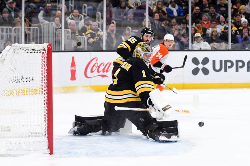 Jan 29, 2026; Boston, Massachusetts, USA; Boston Bruins goaltender Jeremy Swayman (1) makes a save during the second period against the Philadelphia Flyers at TD Garden. Mandatory Credit: Bob DeChiara-Imagn Images