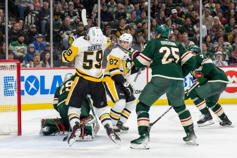 Feb 9, 2024; Saint Paul, Minnesota, USA; Minnesota Wild defenseman Jonas Brodin (25) picks up a high sticking penalty on Pittsburgh Penguins left wing Jake Guentzel (59) in the third period at Xcel Energy Center. Mandatory Credit: Matt Blewett-USA TODAY Sports