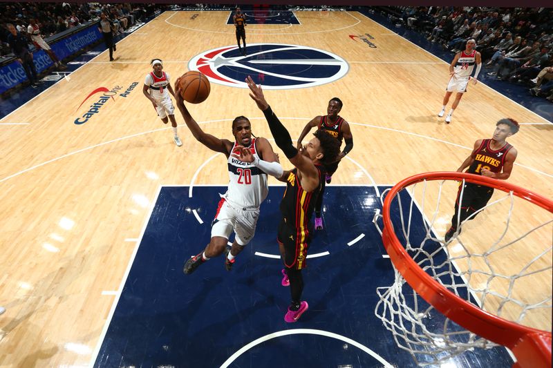 WASHINGTON, DC -? OCTOBER 30: Alexandre Sarr #20 of the Washington Wizards drives to the basket during the game against the Atlanta Hawks  during a regular season game on October 30, 2024 at Capital One Arena in Washington, DC. NOTE TO USER: User expressly acknowledges and agrees that, by downloading and or using this Photograph, user is consenting to the terms and conditions of the Getty Images License Agreement. Mandatory Copyright Notice: Copyright 2024 NBAE (Photo by Kenny Giarla/NBAE via Getty Images)