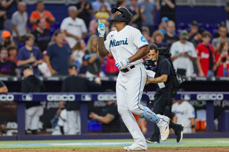 Aug 15, 2023; Miami, Florida, USA; Miami Marlins designated hitter Jorge Soler (12) circles the bases after hitting a two-run home run against the Houston Astros during the third inning at loanDepot Park. Mandatory Credit: Sam Navarro-USA TODAY Sports