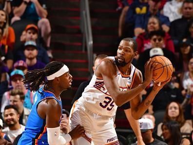 PHOENIX, AZ - NOVEMBER 12: Kevin Durant #35 of the Phoenix Suns looks to pass the ball during the game against the Oklahoma City Thunder on November 12, 2023 at Footprint Center in Phoenix, Arizona. NOTE TO USER: User expressly acknowledges and agrees that, by downloading and or using this photograph, user is consenting to the terms and conditions of the Getty Images License Agreement. Mandatory Copyright Notice: Copyright 2023 NBAE (Photo by Barry Gossage/NBAE via Getty Images)