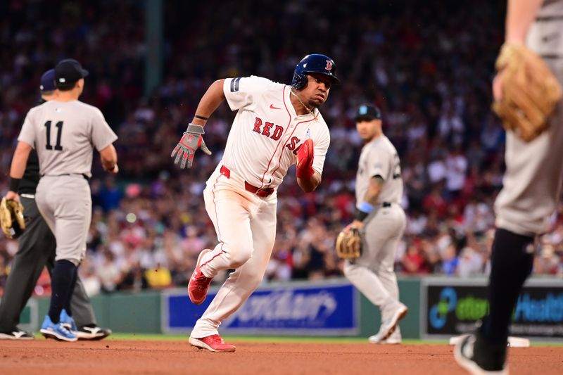 Jun 16, 2024; Boston, Massachusetts, USA; Boston Red Sox second baseman Enmanuel Valdez (47) runs to third base on a ground ball by center fielder Ceddanne Rafaela (43) (not pictured) during the fourth inning against the New York Yankees at Fenway Park. Mandatory Credit: Eric Canha-USA TODAY Sports